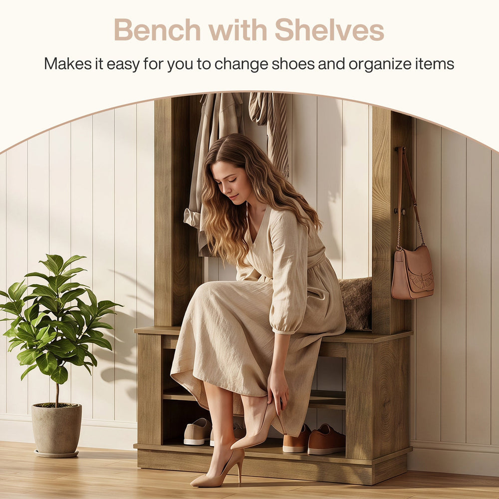 Person sitting on the hall tree bench changing shoes