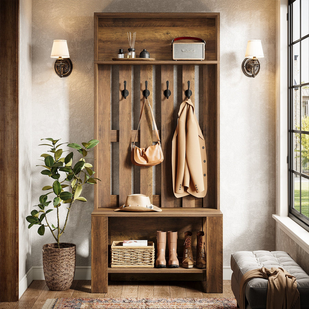 Hall tree with coat, hat and boots in a warm-lit entryway with an umbrella stand