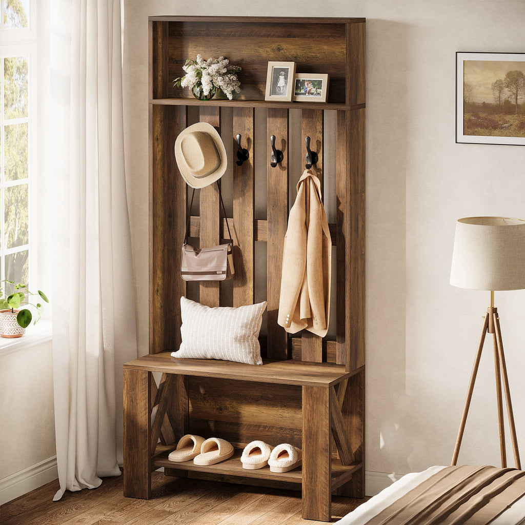 Hall tree styled with a cushion and coat next to a floor lamp