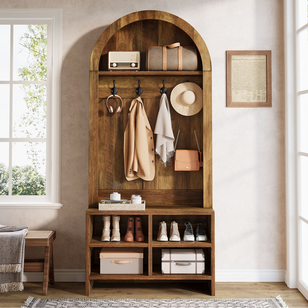 Rustic brown hall tree with baskets on the arched top shelf