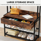 Open drawer under the bench seat holding entry essentials over two shoe shelves