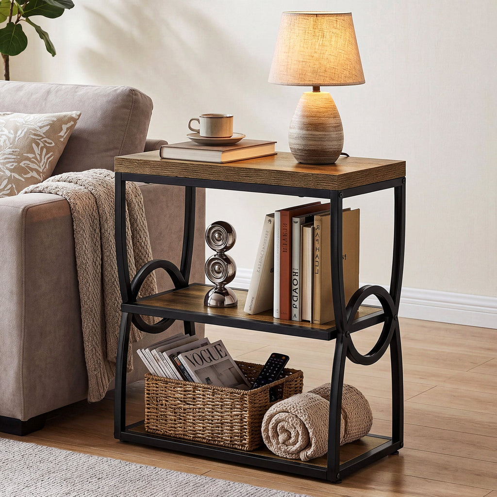 Narrow end table with a lamp and folded throws stored on the lower shelves
