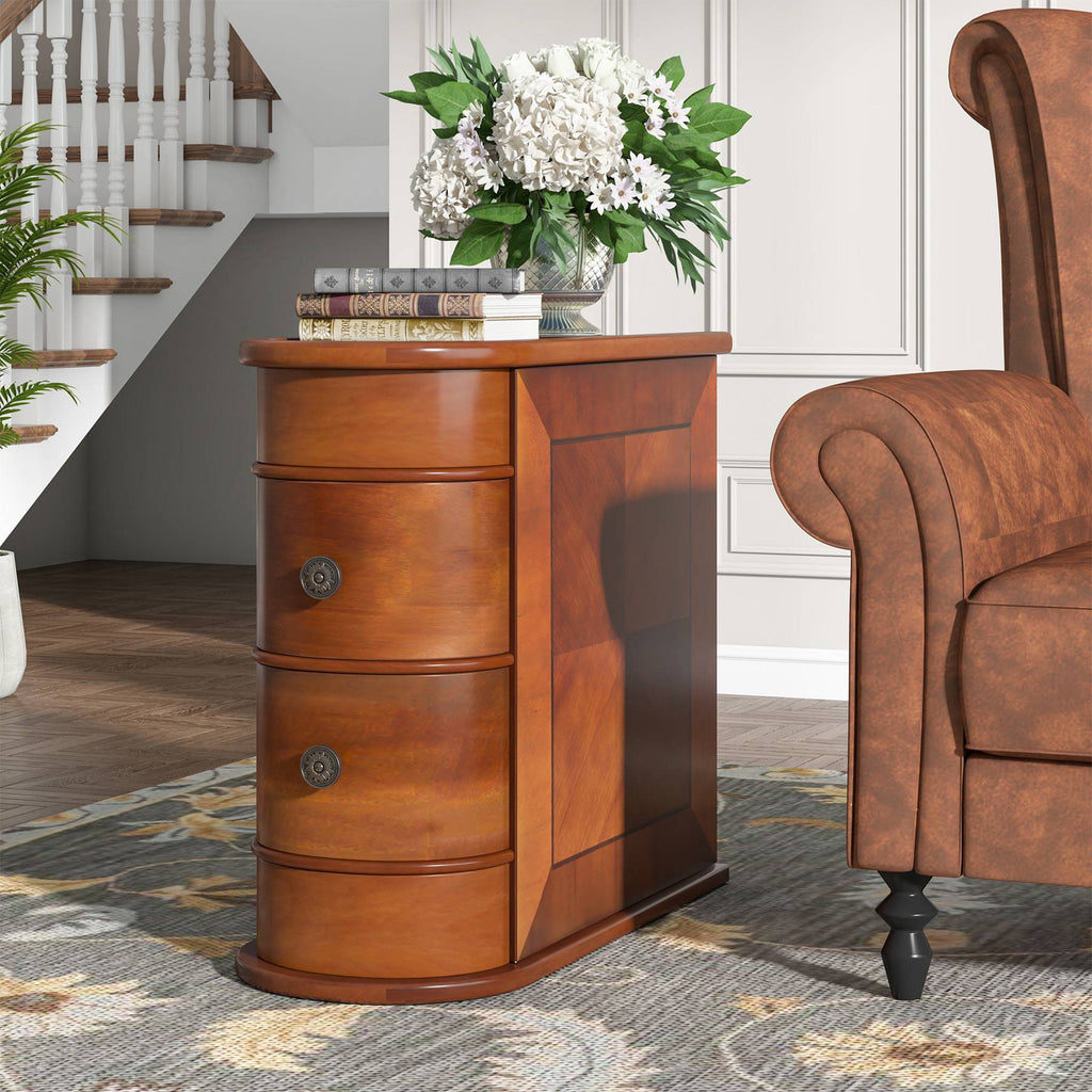 Walnut chairside end table beside a leather armchair with a vase of flowers on top