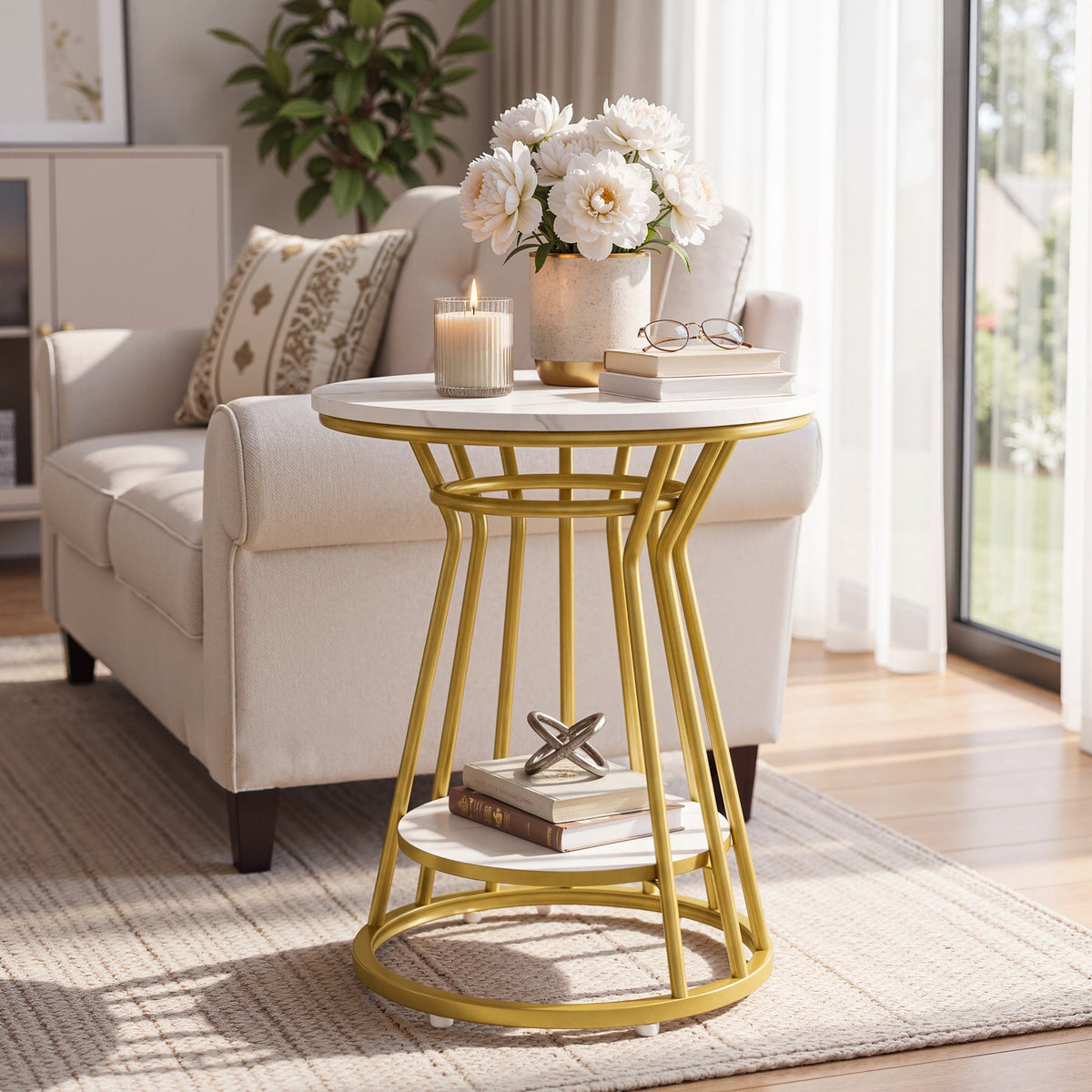 Marble look side table with candle and flowers beside a white couch