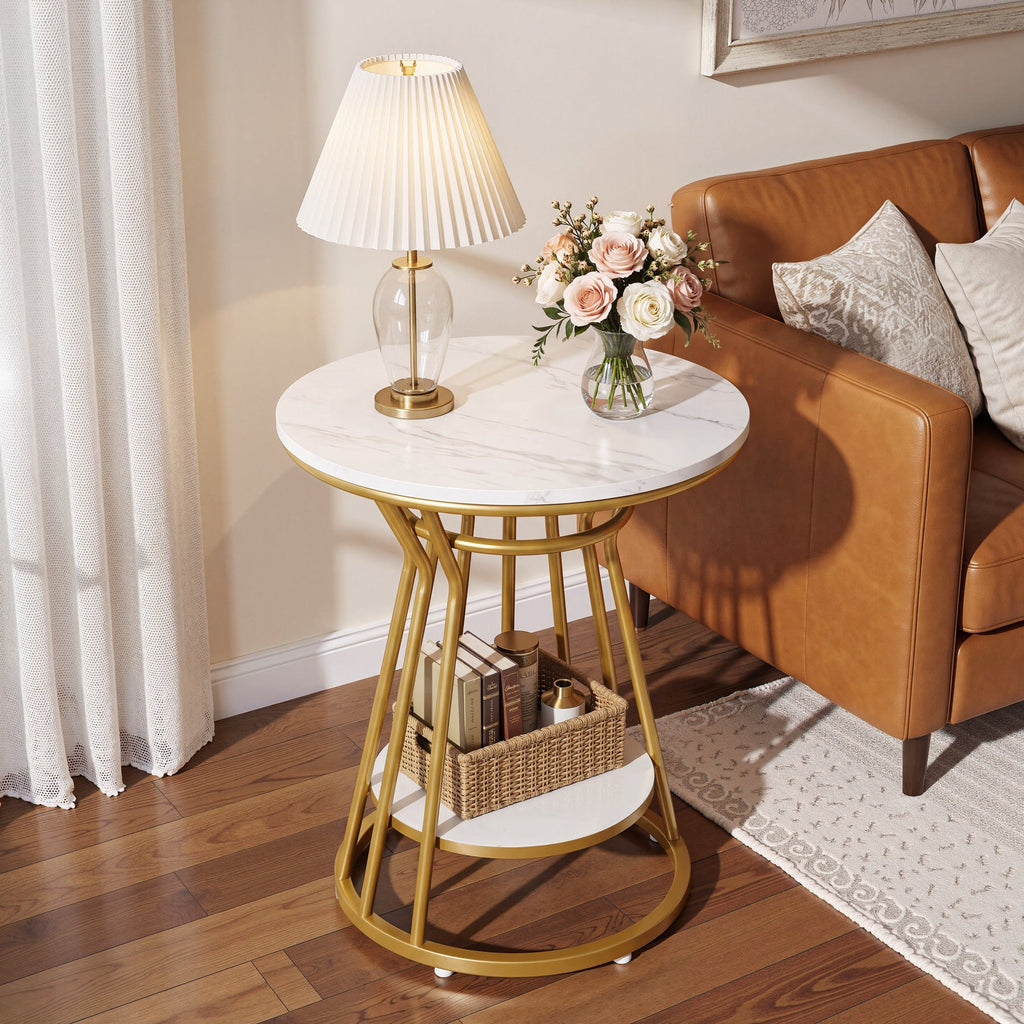 Gold frame side table with pleated lamp beside a leather sofa