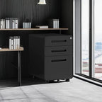 Black 3 drawer mobile file cabinet rolled under a wooden desk in a dark modern home office