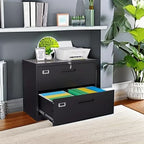 Black 2 drawer lateral file cabinet used as a printer stand in a grey home office, lower drawer open with coloured files
