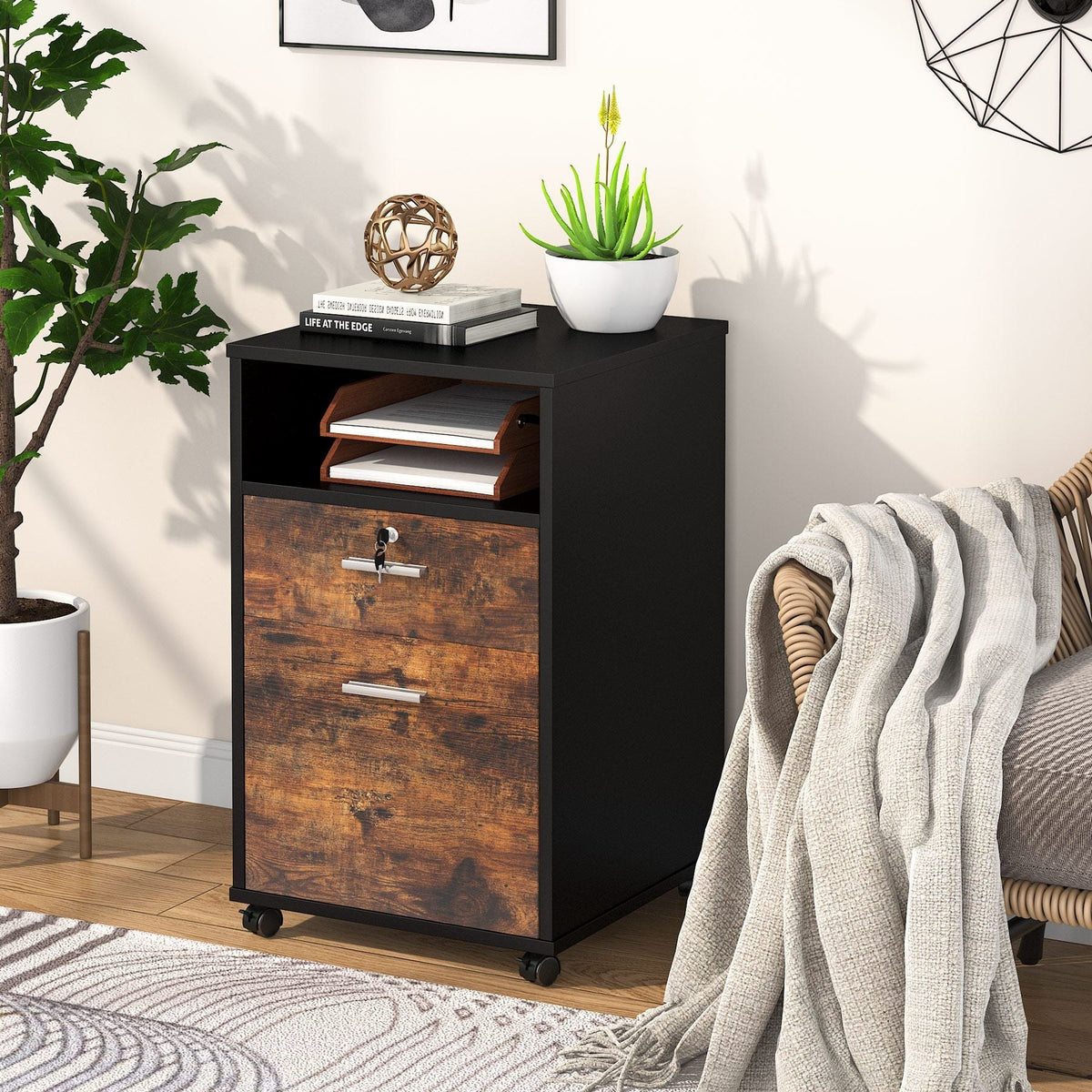 File cabinet used as a side table with books and a plant on top