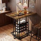 Rustic island with a serving tray, wine rack and hanging glasses in a wood-paneled kitchen