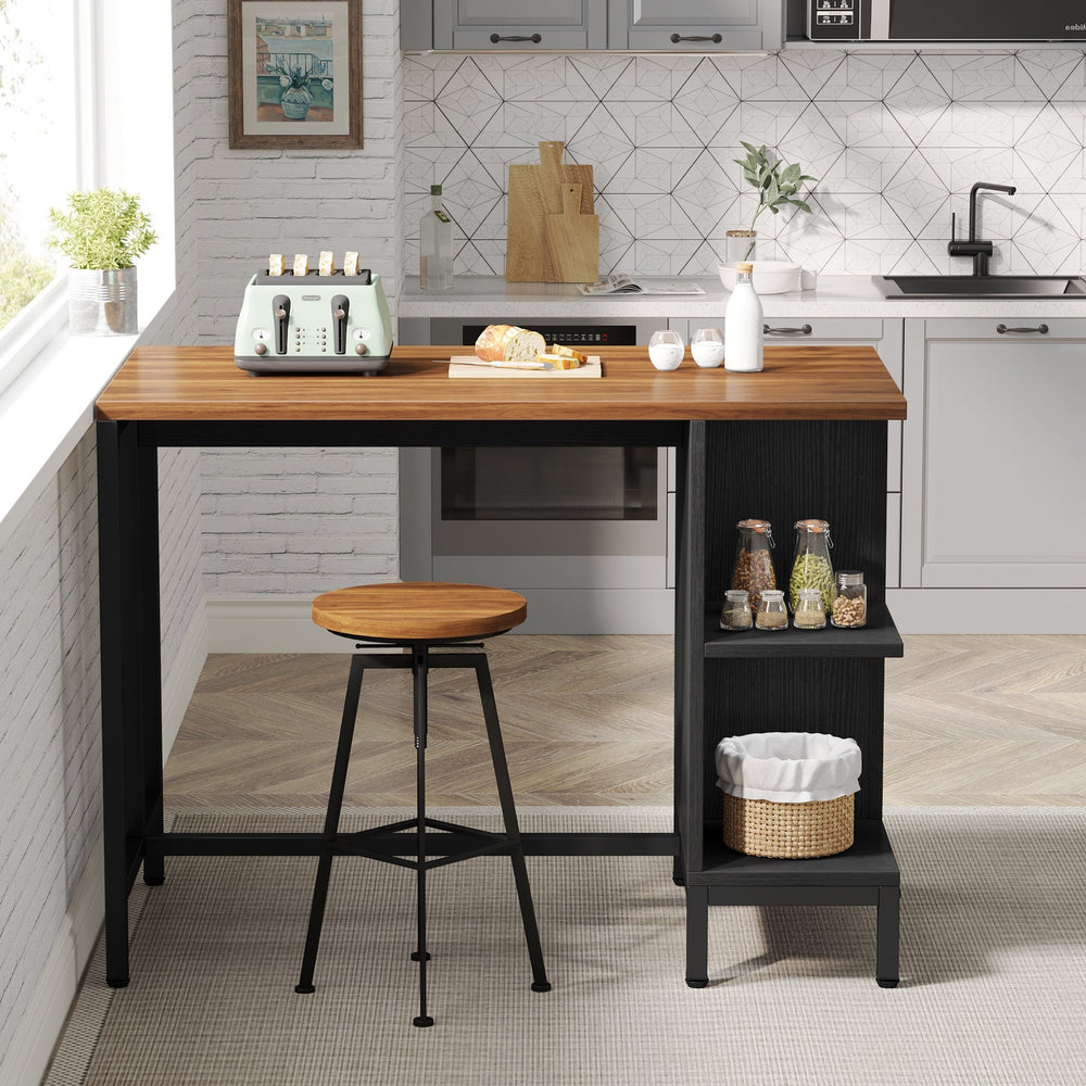 Walnut and black island against a kitchen wall with toaster and baskets