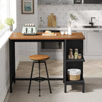 Walnut and black island against a kitchen wall with toaster and baskets