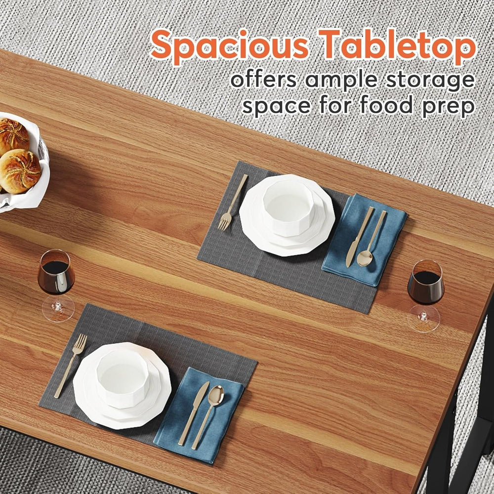 Spacious walnut tabletop from above with place settings