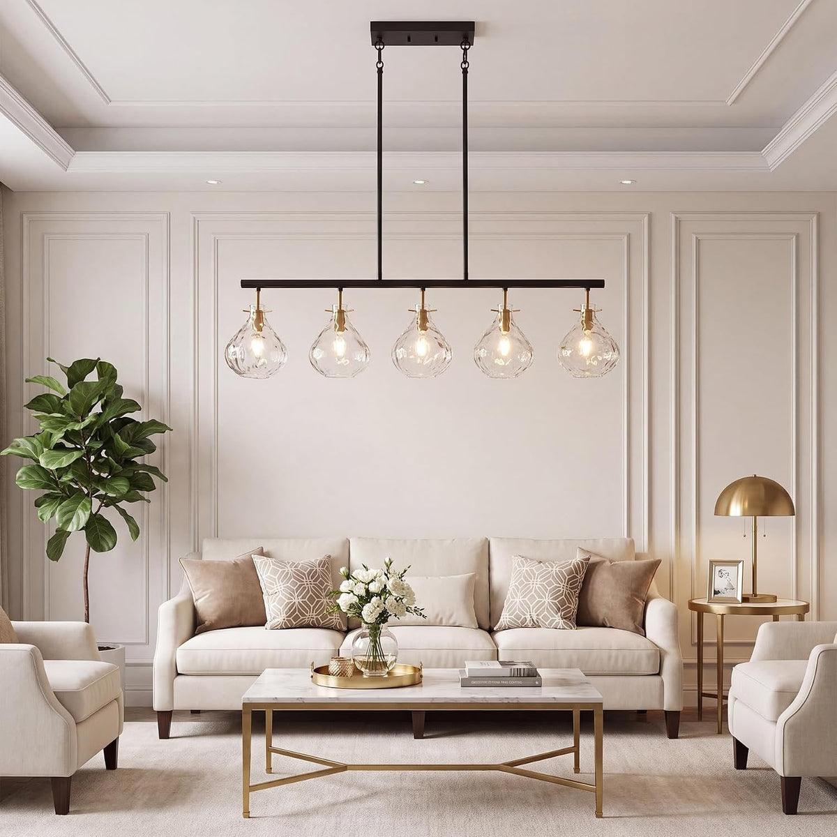 The five light chandelier lit above a sofa and a marble coffee table