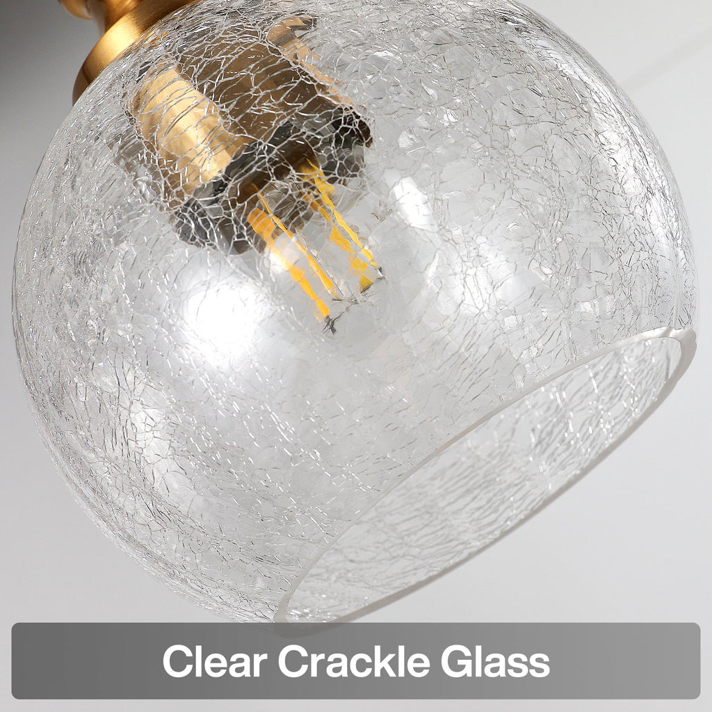 Close view of a single clear crackle glass globe with the filament behind it