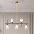 Five light brushed brass chandelier with gradient frosted glass shades below a ceiling rose