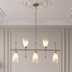 Five light brushed brass chandelier with gradient frosted glass shades below a ceiling rose
