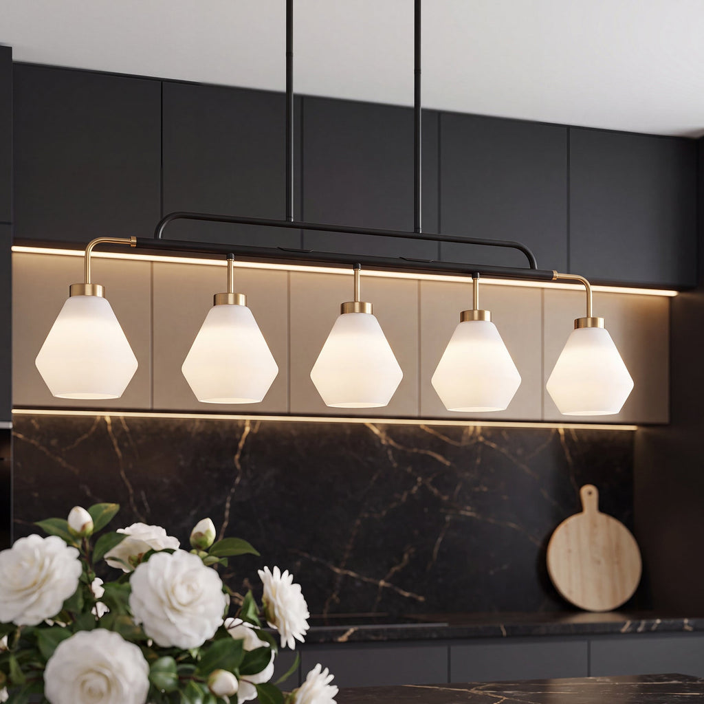 The frosted glass pendant hanging over a dining table set for breakfast