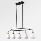 The five light frosted glass pendant on its black bar against a plain background