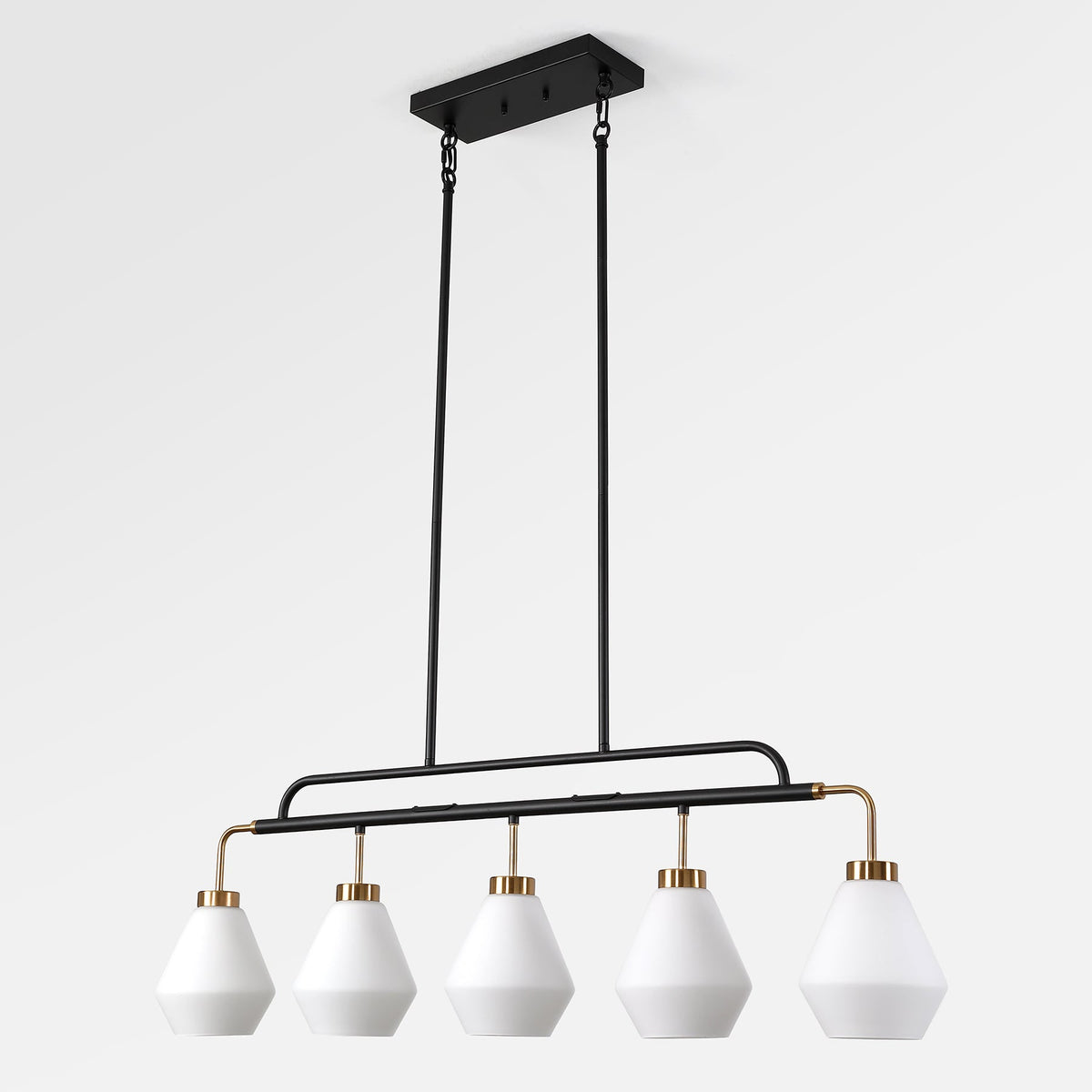 The five light frosted glass pendant on its black bar against a plain background