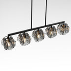 Straight on view of the five light chandelier with smoky gray glass against a plain background