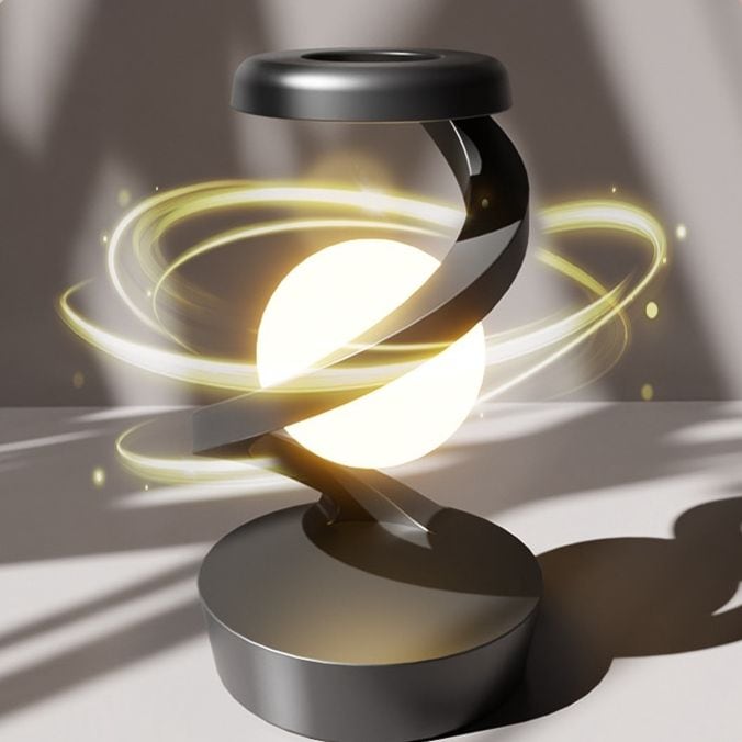 Spiral arm of the gray moon lamp shown mid rotation with light trails