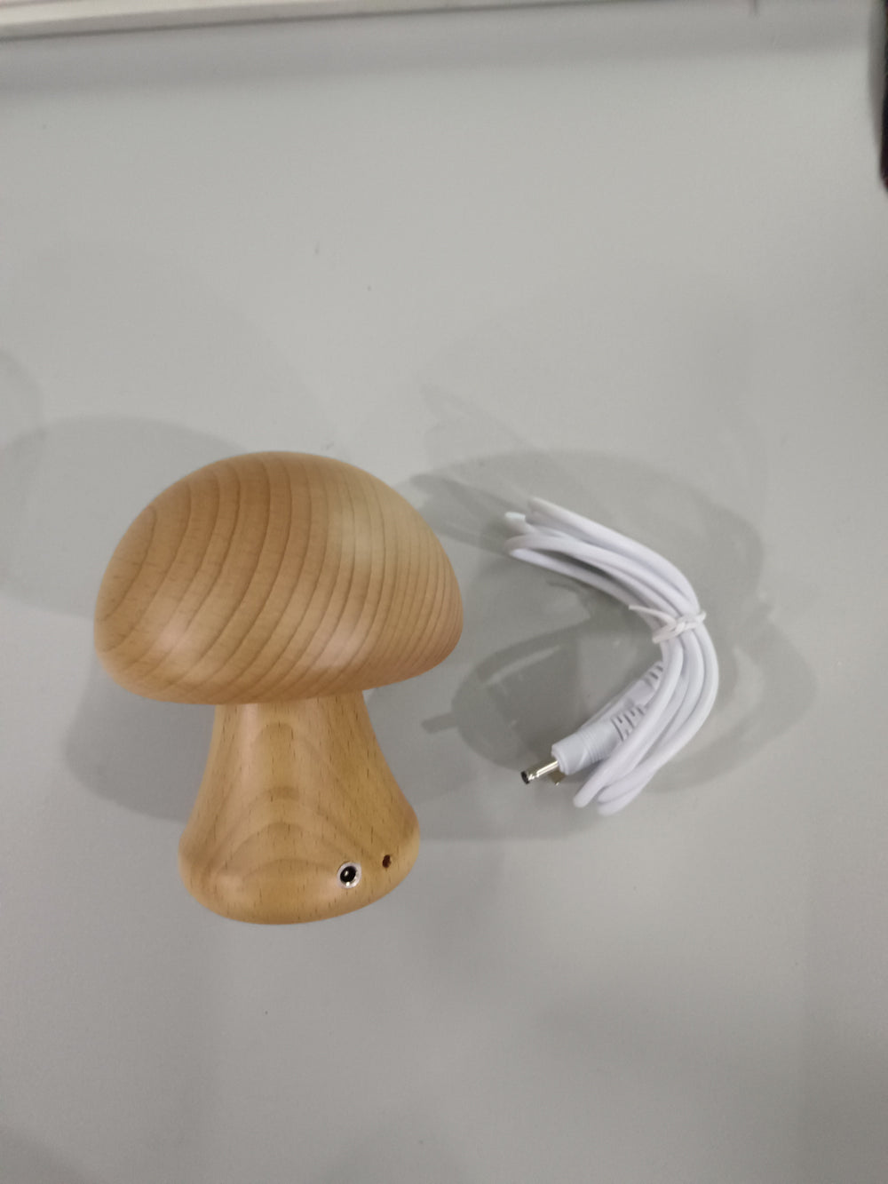 Wooden mushroom night light with included charging cable, view 4