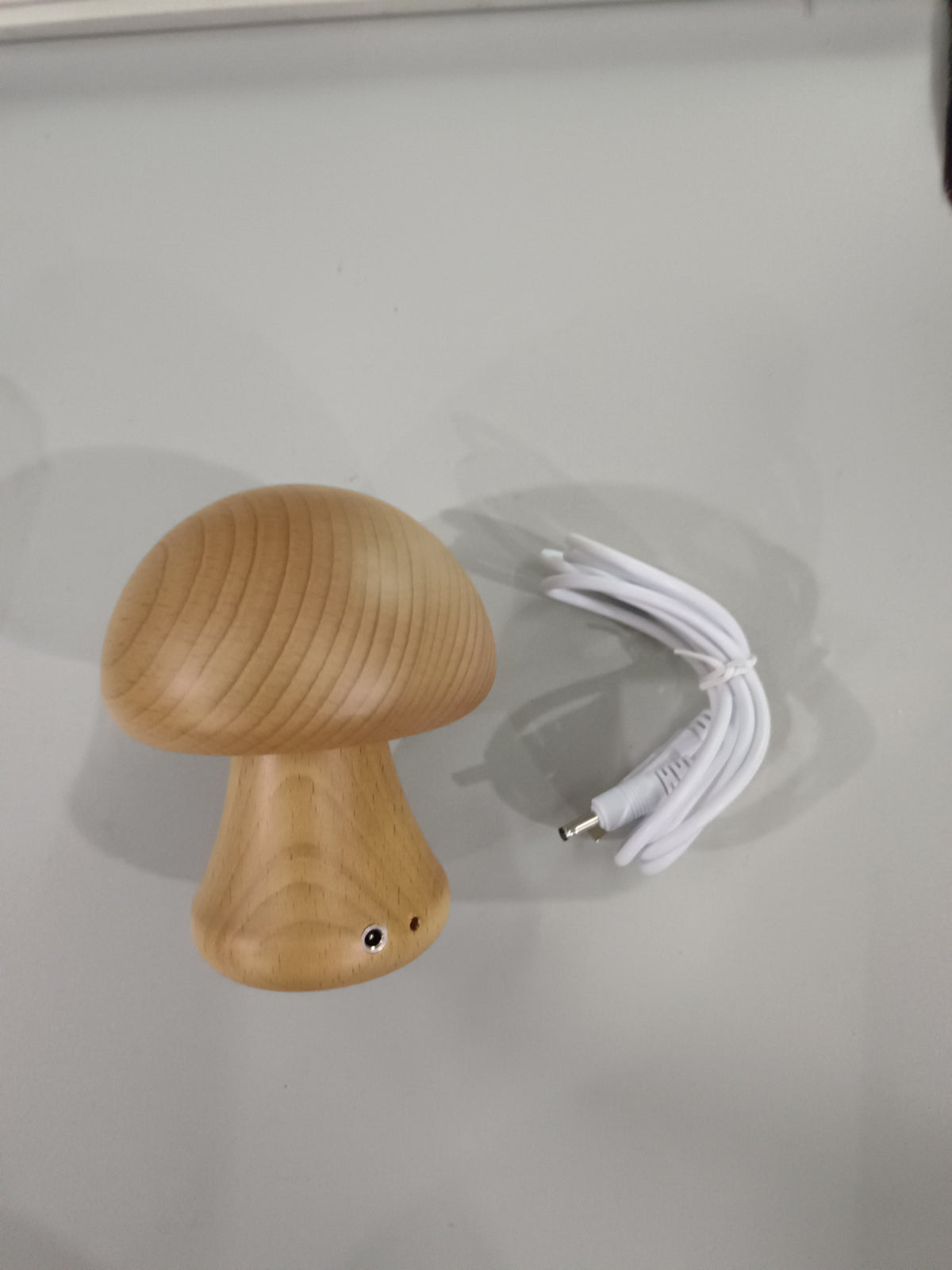 Wooden mushroom night light with included charging cable, view 4