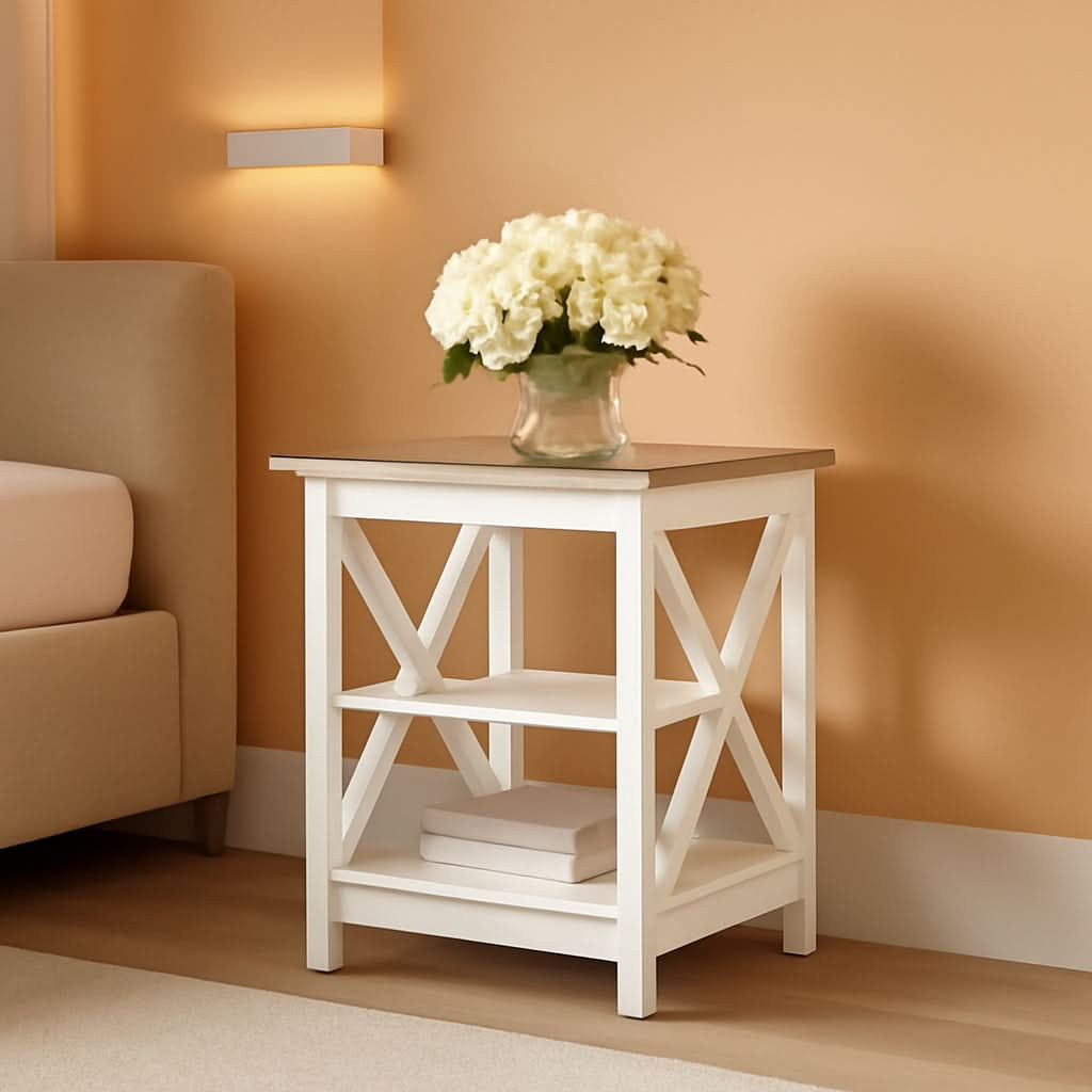 Stowena rustic ivory X frame nightstand with flowers beside a beige sofa