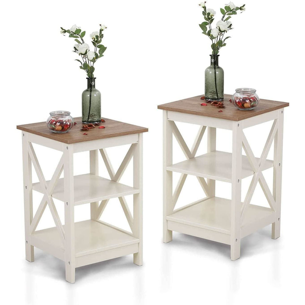 The set of two ivory nightstands shown together with vases and jars
