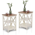 The set of two ivory nightstands shown together with vases and jars