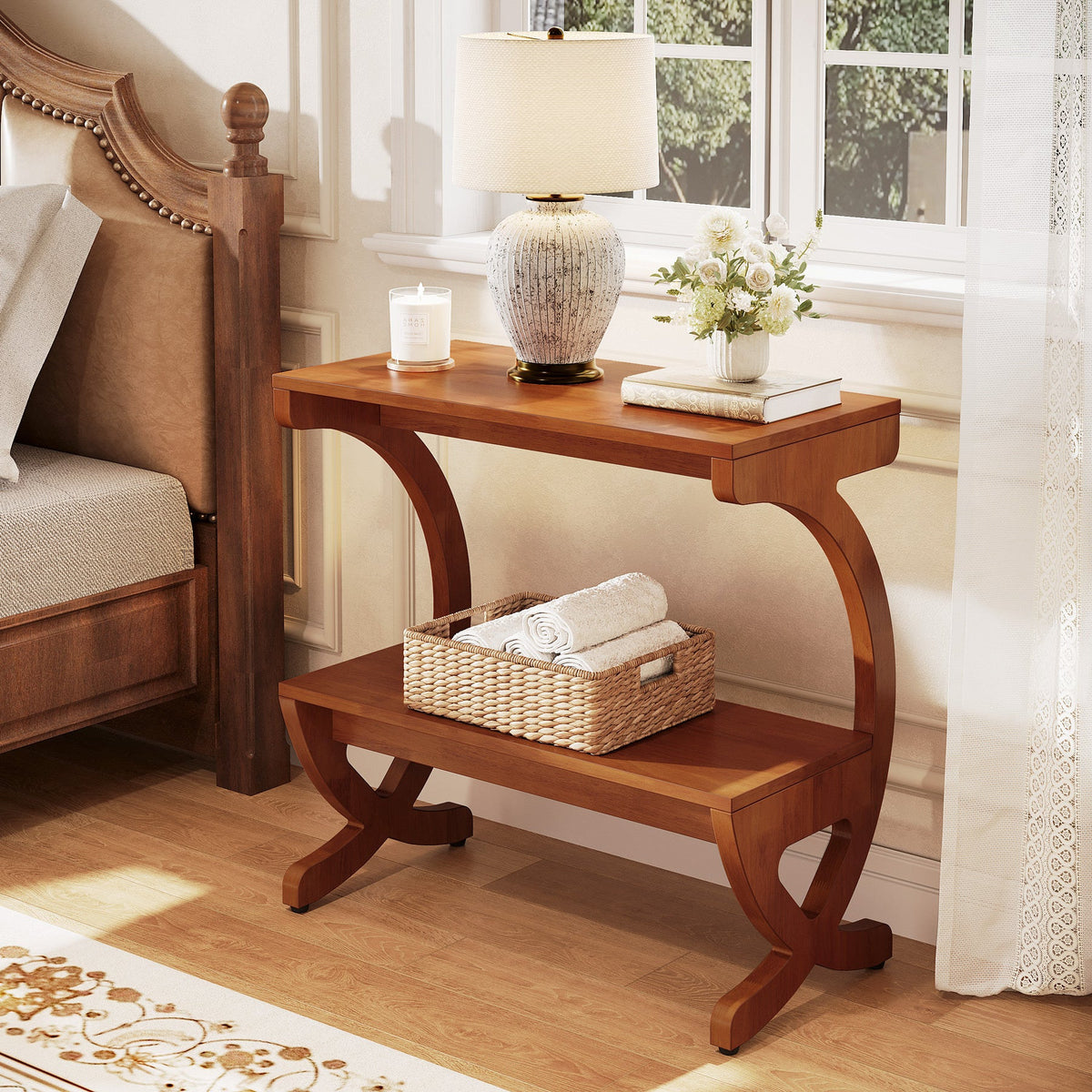 Stowena walnut solid wood nightstand beside a bed with a lamp and basket