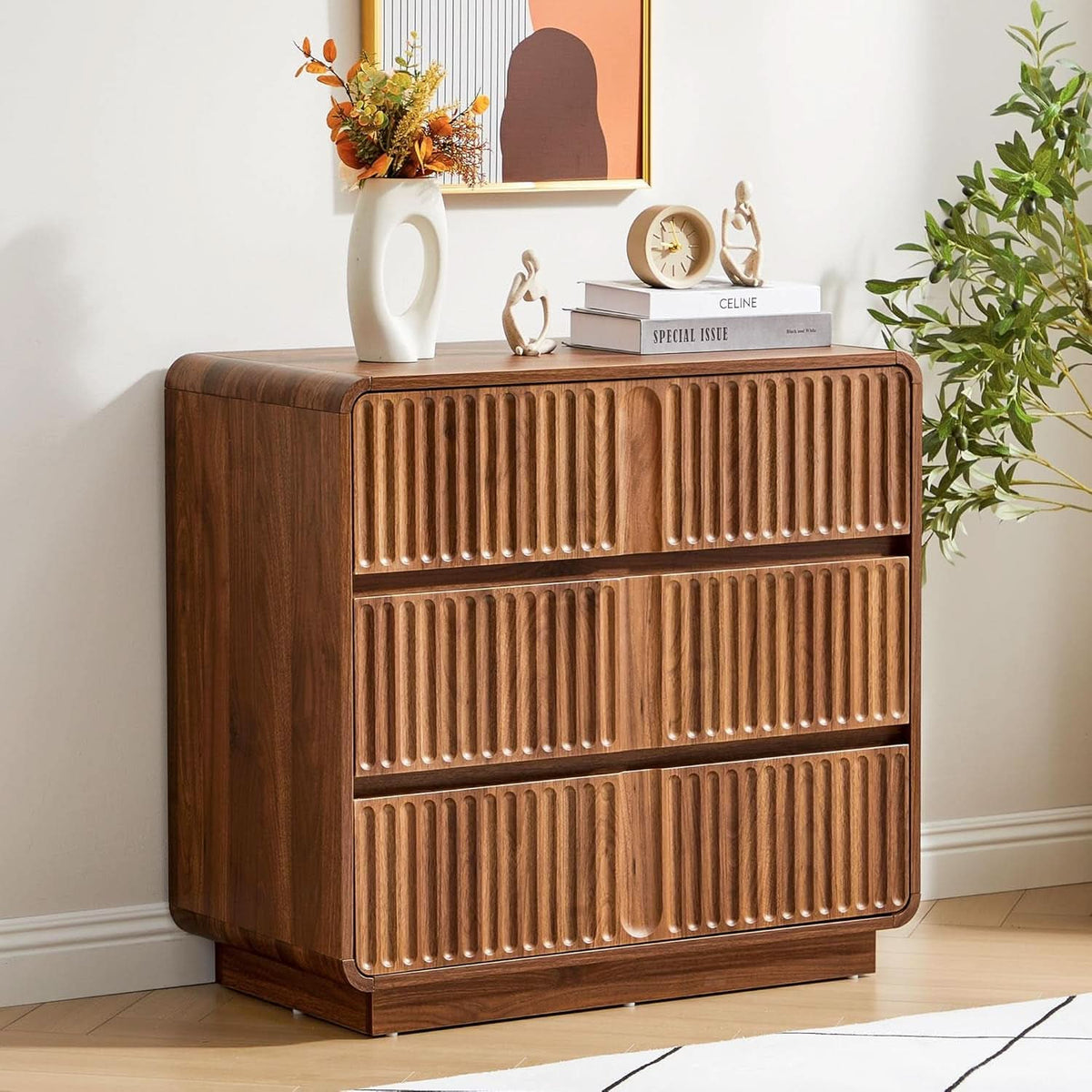 The fluted dresser seen at an angle showing the curved corners and box frame base