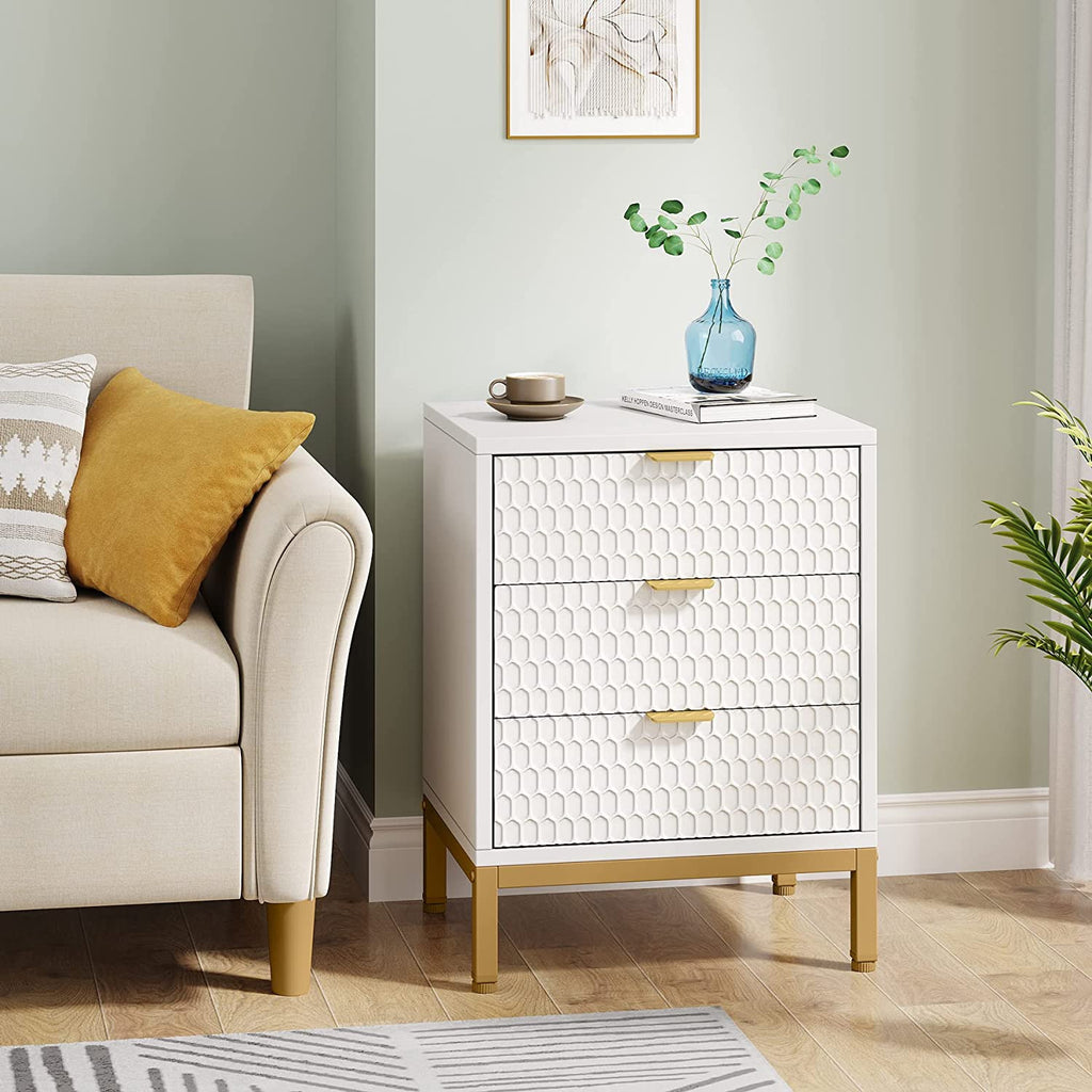 Honeycomb front nightstand as a side table next to a cream sofa with a blue vase