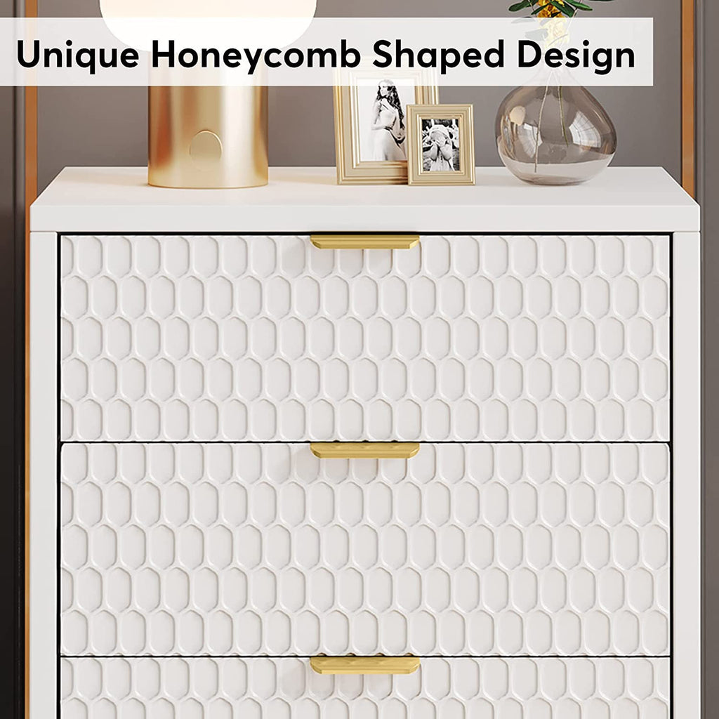 Close-up of the unique honeycomb shaped drawer fronts with gold handles
