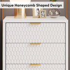 Close-up of the unique honeycomb shaped drawer fronts with gold handles