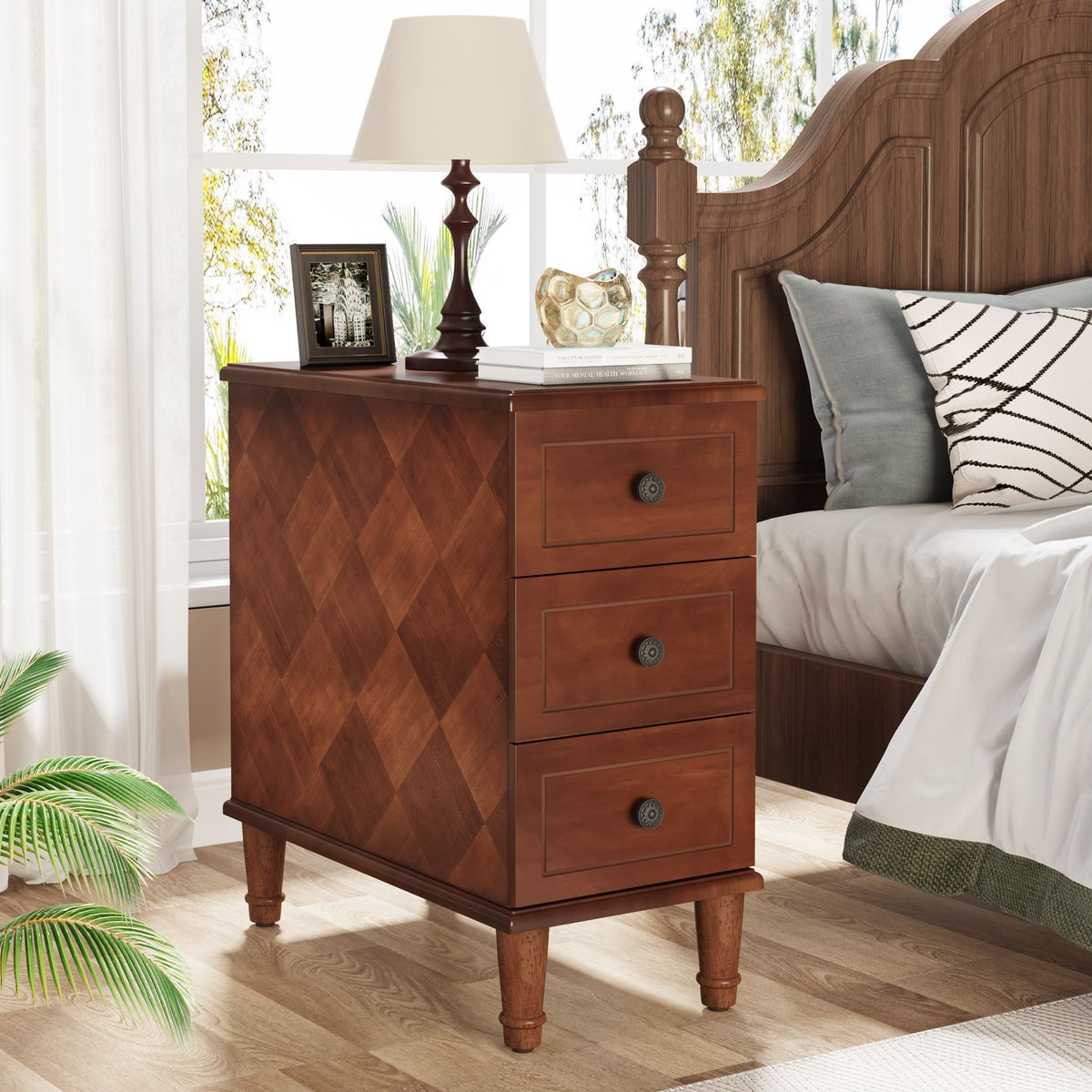 Diamond parquet nightstand beside a bed with a lamp and books