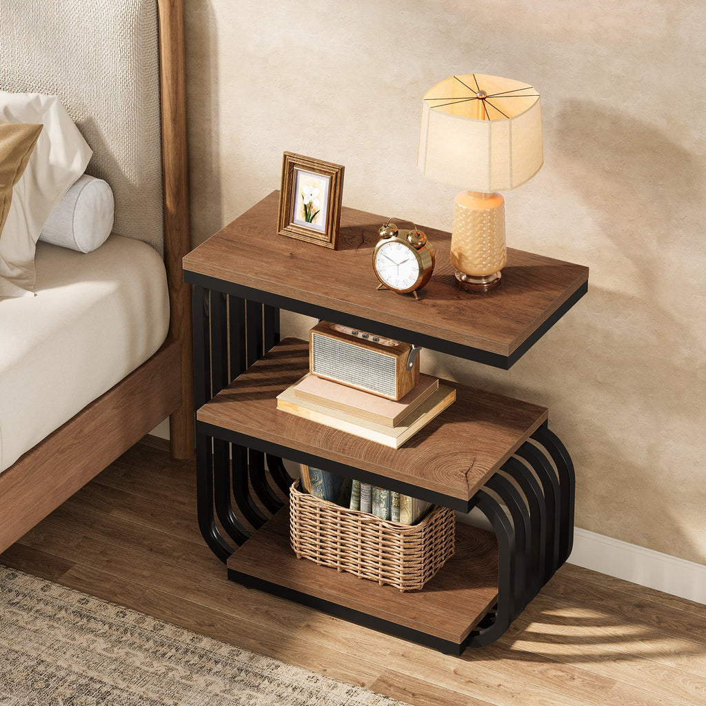 Narrow bedside table with a clock, frame and basket on its shelves