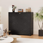 Stowena black outdoor storage cabinet with diamond pattern doors beside a plant
