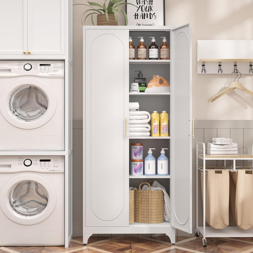 White metal storage cabinet in a laundry room between a washer and hampers, one door open