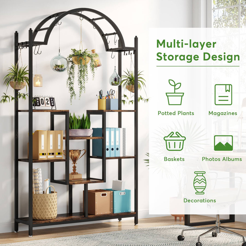 Arched plant rack holding plants, baskets and folders against a bright wall