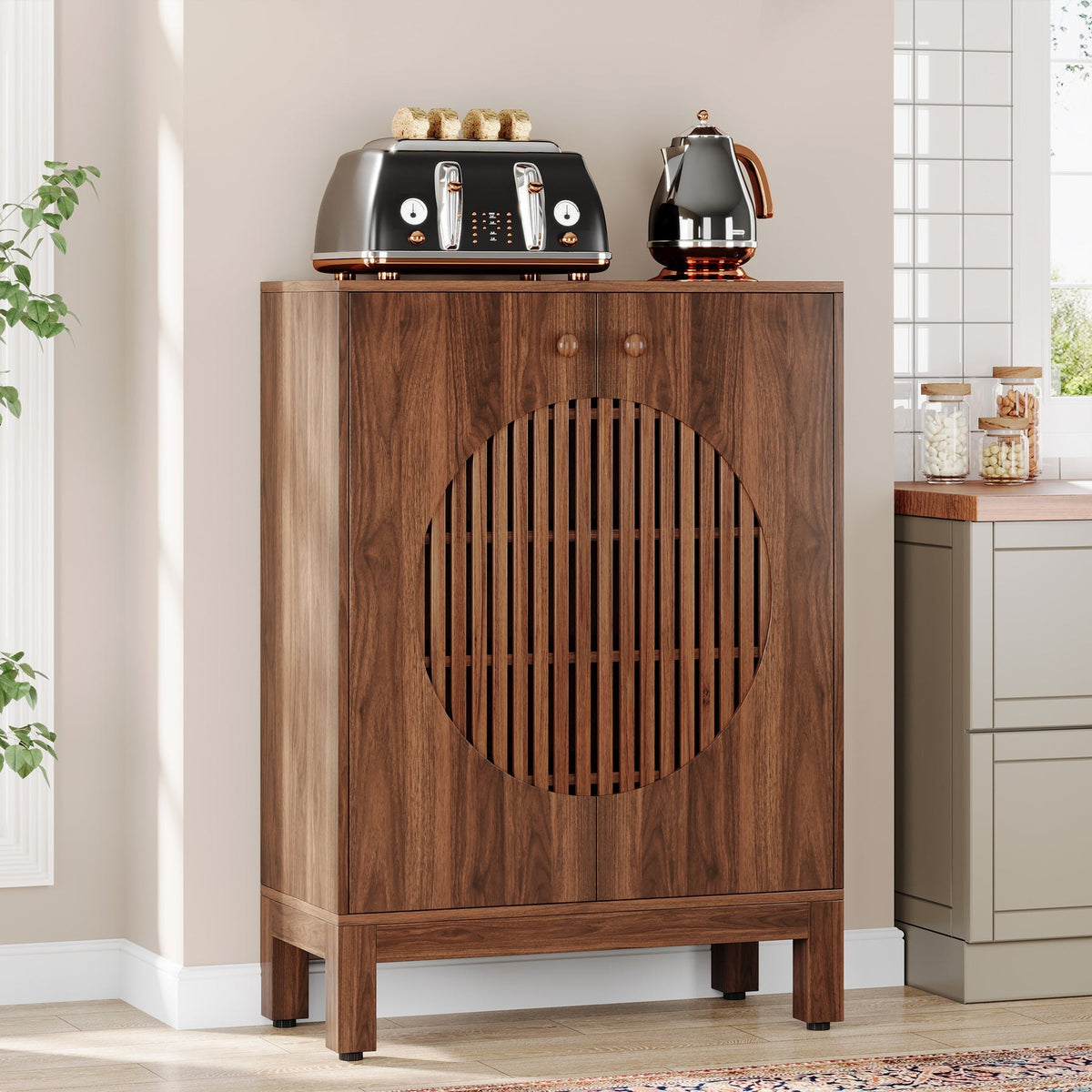 Stowena farmhouse sideboard buffet with louvered doors in a kitchen with a toaster and kettle on top