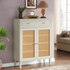 Stowena mint green rattan sideboard cabinet with drawer beside a sofa and floor plant