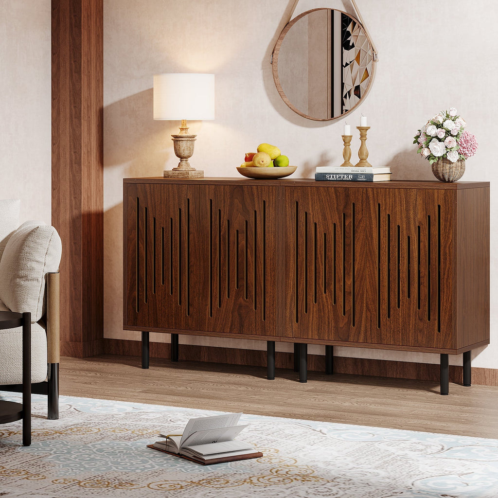 Walnut buffet cabinets under a round mirror in a dining room