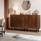 Walnut buffet cabinets under a round mirror in a dining room