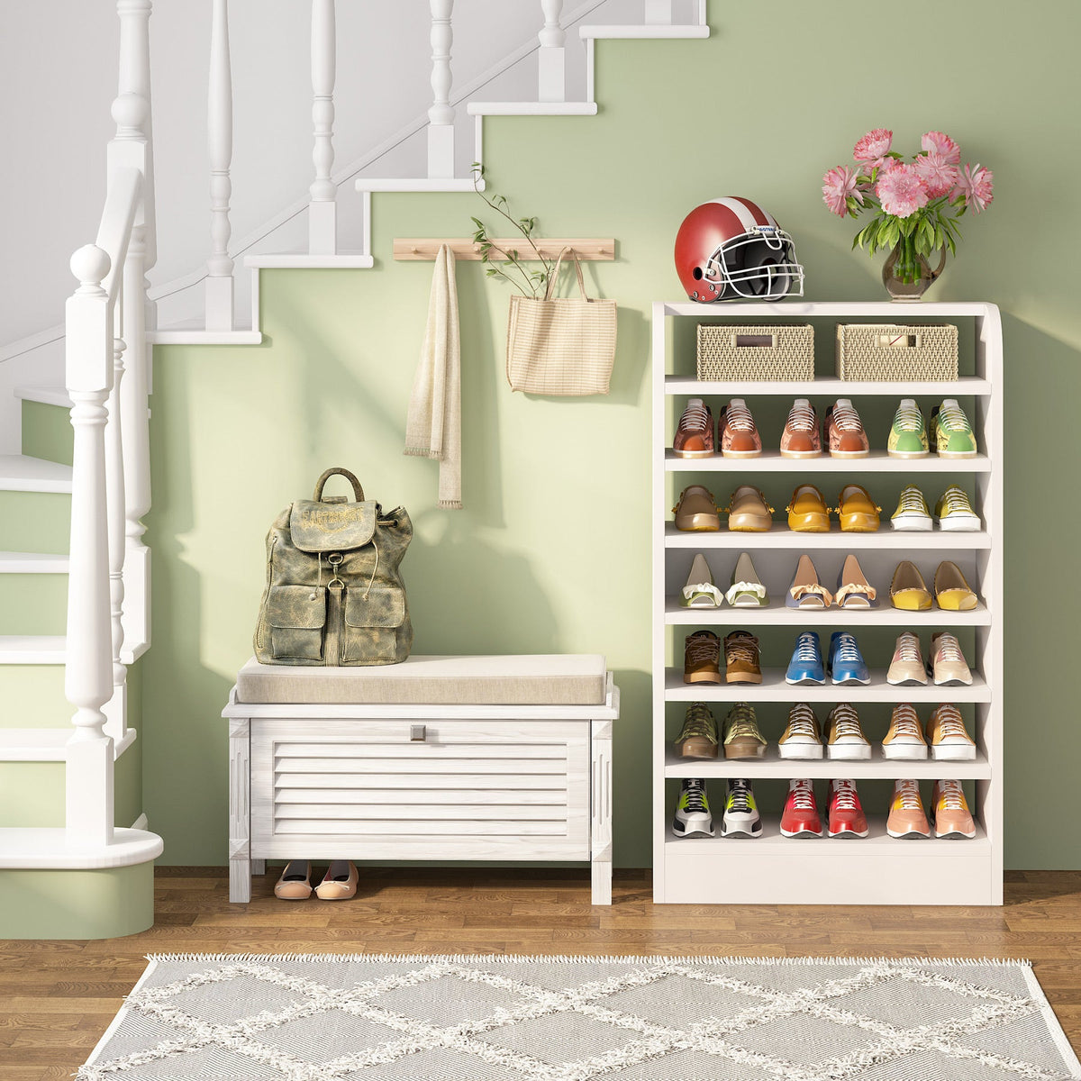 White shoe shelf by a staircase with shoes and baskets on its tiers