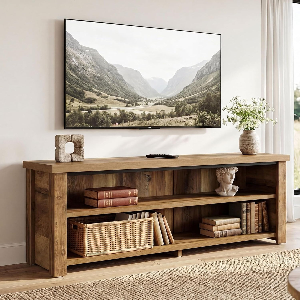 Stowena 55.1 inch farmhouse TV stand with a TV and decor on the two open tiers