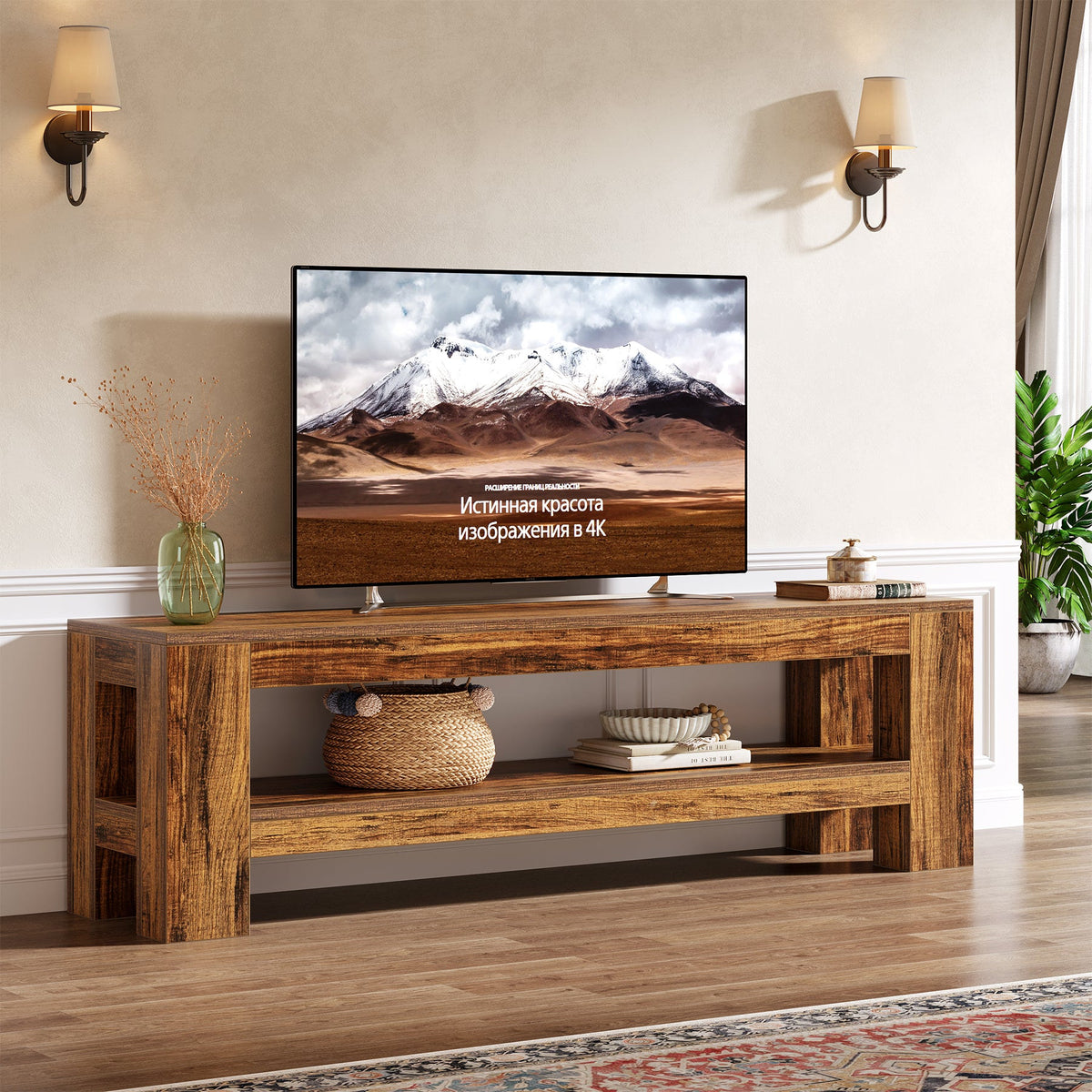 59 inch TV console holding a mid-size TV with a speaker and basket on the lower shelf