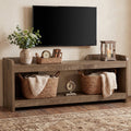 Stowena 63 inch TV stand with a 65 inch TV, baskets and books on the 2 open tiers