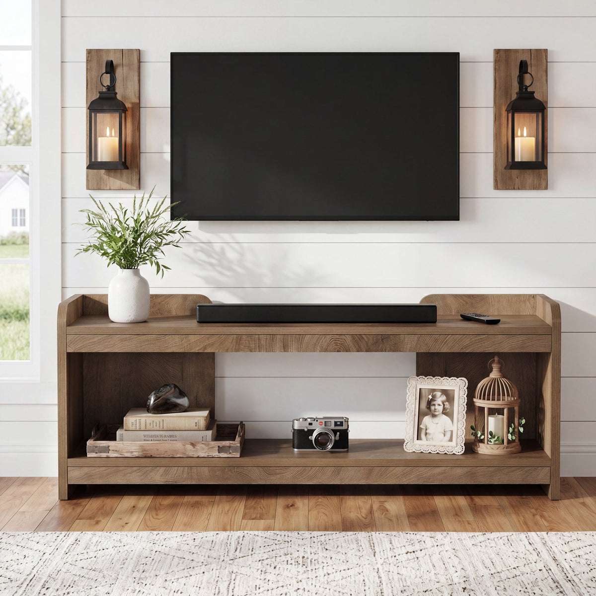 63 inch TV console under a wall-mounted TV with a soundbar on the top shelf