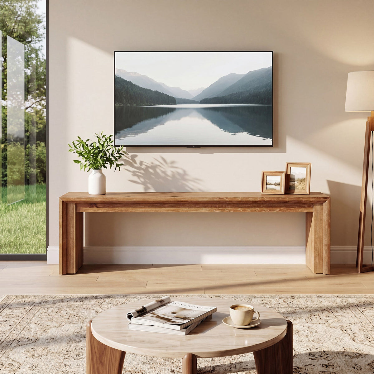 Farmhouse TV bench with mountain scene on screen by a round side table